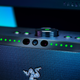 A close-up of the Razer Leviathan V2 Pro's controls and IR camera used for head tracking.
